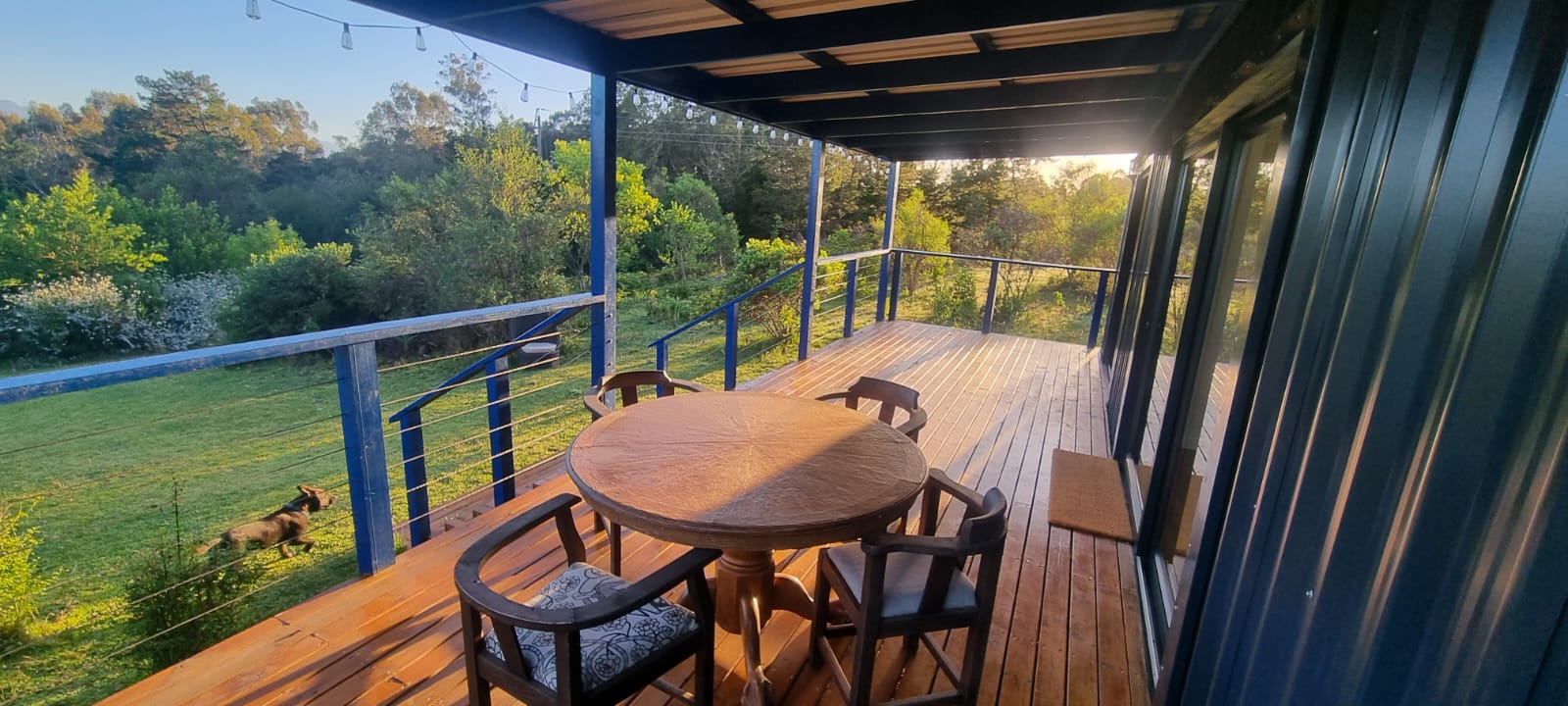 Loft Haven — timber deck at golden hour